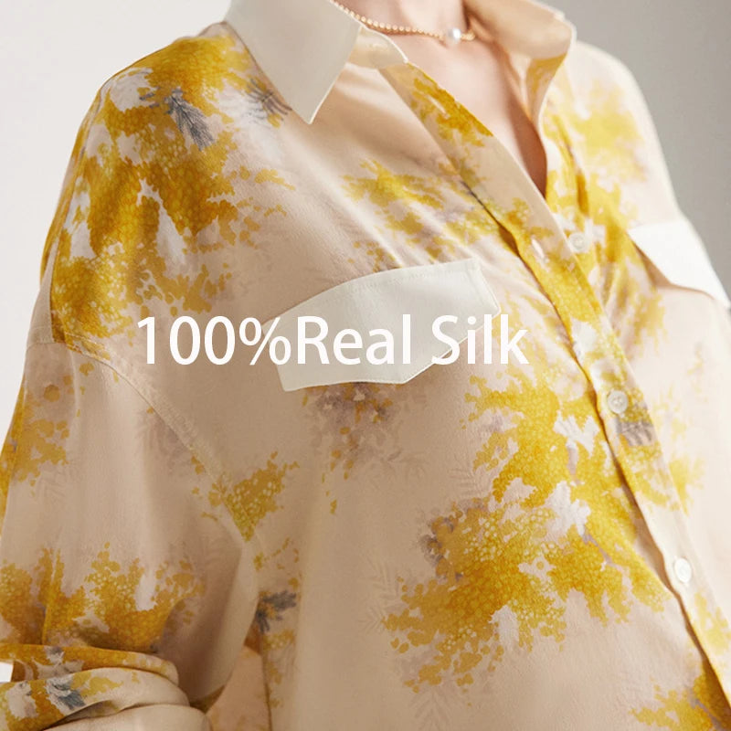 Upper part of a 100% Mulberry Silk Print Shirt featuring a dawn pink background with delicate yellow blooms, contrast collar, and bold accents. From Borcelleclothes.