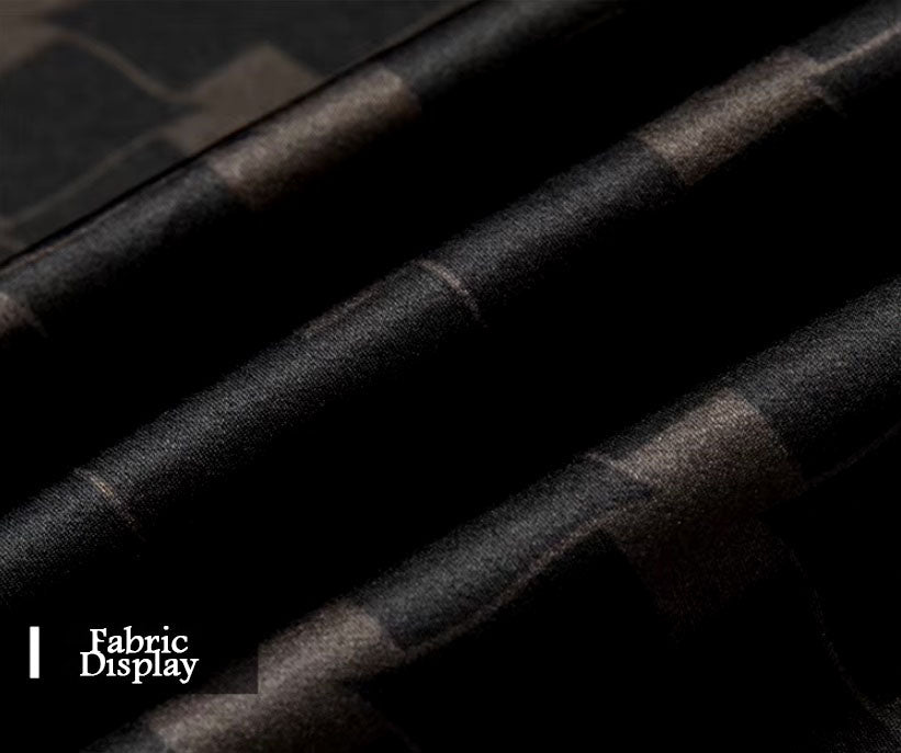 Mulberry silk fabric in deep brown, featuring a geometric rhombus mesh design, held and draped to showcase its luxurious texture and flow. From Borcelleclothes.