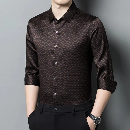 The front of the Men's Mulberry silk shirt in English Walnut featuring a unique geometric design with intricate rhombuses and vibrant orange accents. The shirt combines luxurious fabric with refined elegance, perfect for a sophisticated look. From Borcelleclothes.