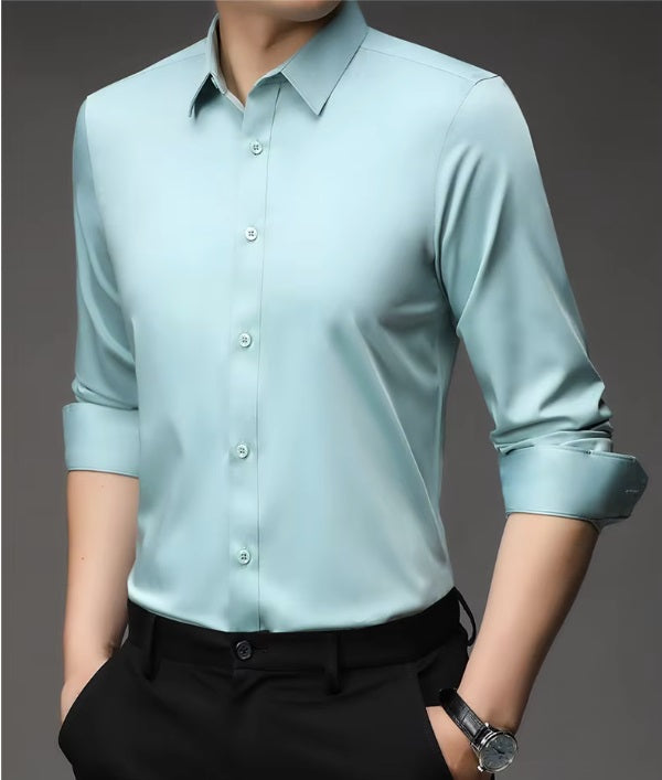 Men's 100% Mulberry silk shirt in solid Jagged Ice featuring a pointed collar, single-breasted front, and a modern tailored silhouette. The shirt offers comfort, elegance, and a smooth, breathable texture. From Borcelleclothes.