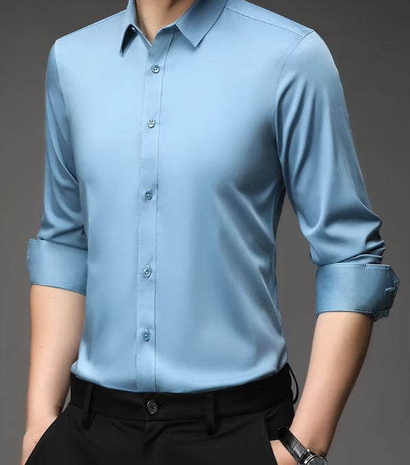 Men's 100% Mulberry silk shirt in solid Pale Cerulean featuring a pointed collar, single-breasted front, and a modern tailored silhouette. The shirt offers comfort, elegance, and a smooth, breathable texture. From Borcelleclothes.