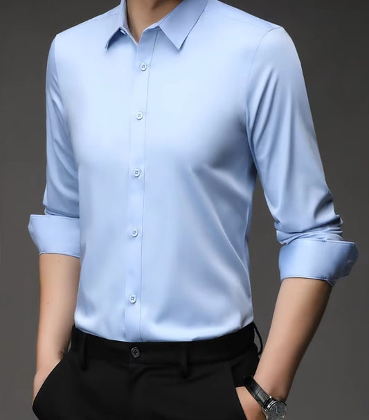 Men's 100% Mulberry silk shirt in solid Tropical Blue, featuring a pointed collar, single-breasted front, and a modern tailored silhouette. The shirt offers comfort, elegance, and a smooth, breathable texture. From Borcelleclothes.
