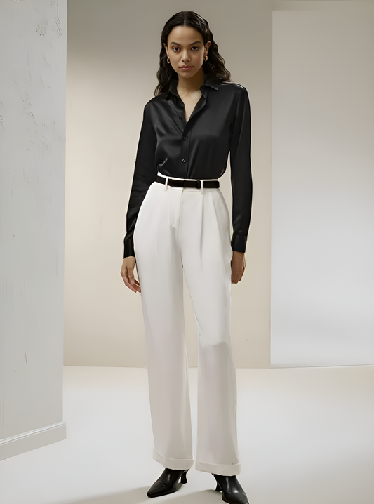 The front of a Women's Business Midweight Satin Silk Shirt in Onyx, crafted from 100% Mulberry silk with a luxurious midweight satin finish. The shirt showcases a smooth, lustrous texture that offers elegance and sophistication, ideal for formal and professional settings. From Borcelleclothes.