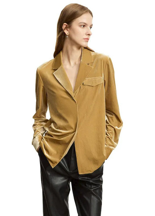 The front of a Women's Silk Velvet Shirt in Camel, crafted from a luxurious silk and viscose blend. Featuring a soft gloss, breathability, a notched collar, single-breasted closure, and left-side flap pocket, this health-conscious velvet shirt offers elegance and comfort for professional and casual wear. From Borcelleclothes.