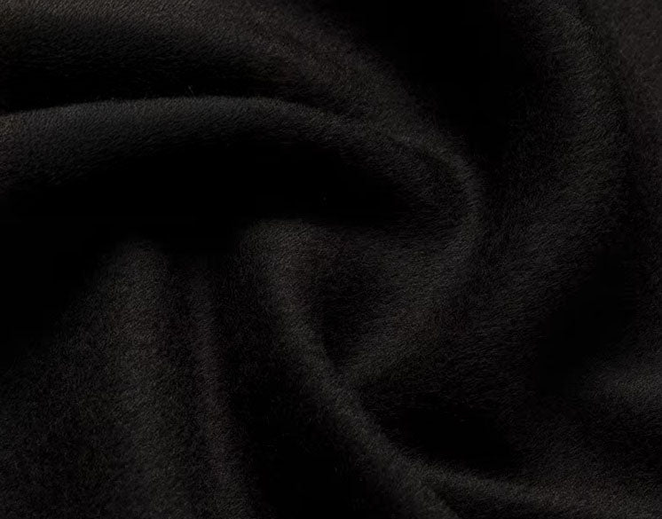 Onyx cashmere fabric, highlighting the luxurious blend of 70% cashmere and 30% wool with a soft, fluid drape. From Borcelleclothes.