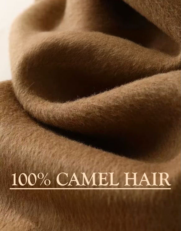 Demonstration of 100% camel hair fabric in Bourbon, showcasing its soft drape, natural sheen, and luxurious texture. From Borcelleclothes.