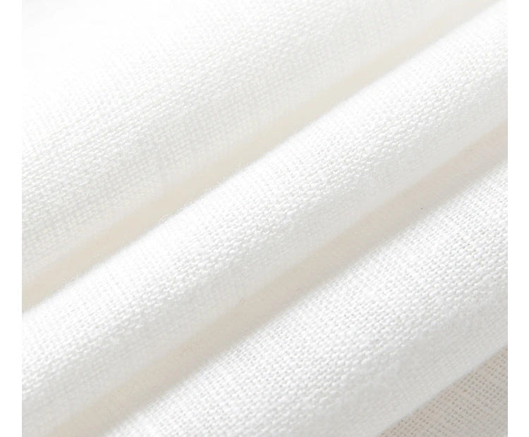 Close-up of Alabaster fabric with wave-like folded texture. From Borcelleclothes.