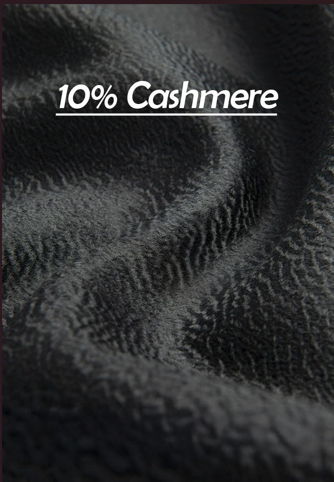 Close-up of Onyx wool-cashmere blend fabric showing texture and weave. From Borcelleclothes.