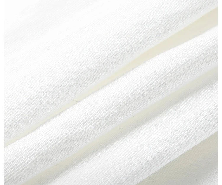 Close-up of Platinum fabric with wave-like folded texture. From Borcelleclothes.