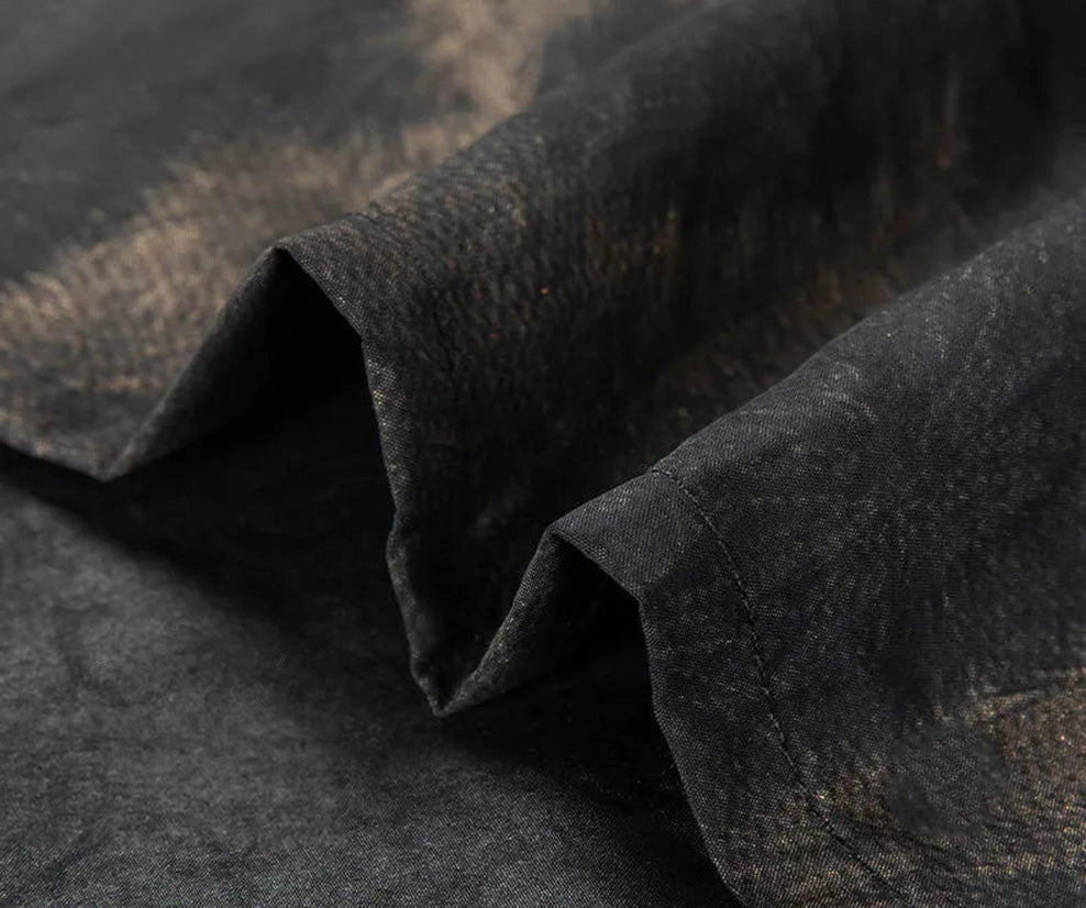 Bottom hem detail of Men's Xiangyunsha silk shirt in Rutilated Graphite color, showing the clean finished handmade edge — From Borcelleclothes.