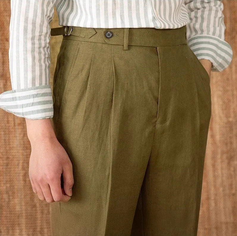 Upper front view of 100% linen trousers in Shadow, featuring muted tones and precise pleating. From Borcelleclothes.