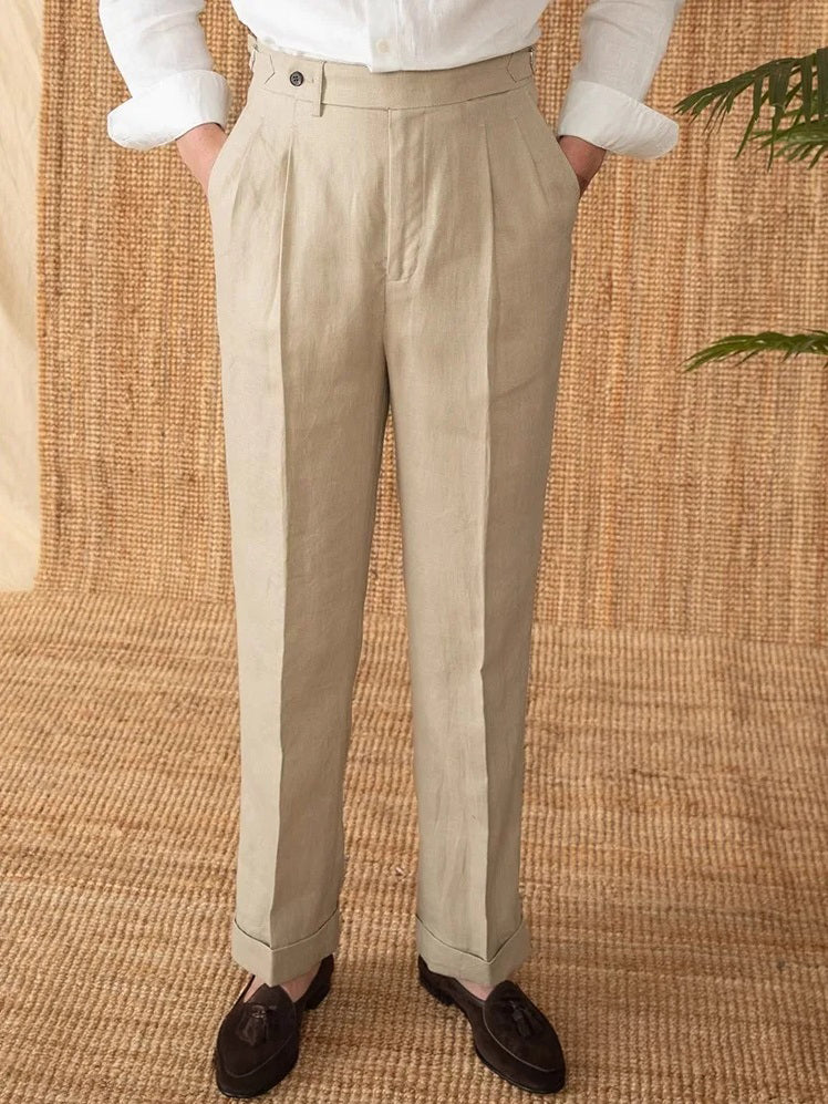Model wearing 100% linen trousers in Soft Amber with hands in pockets, highlighting relaxed fit and natural drape. From Borcelleclothes.