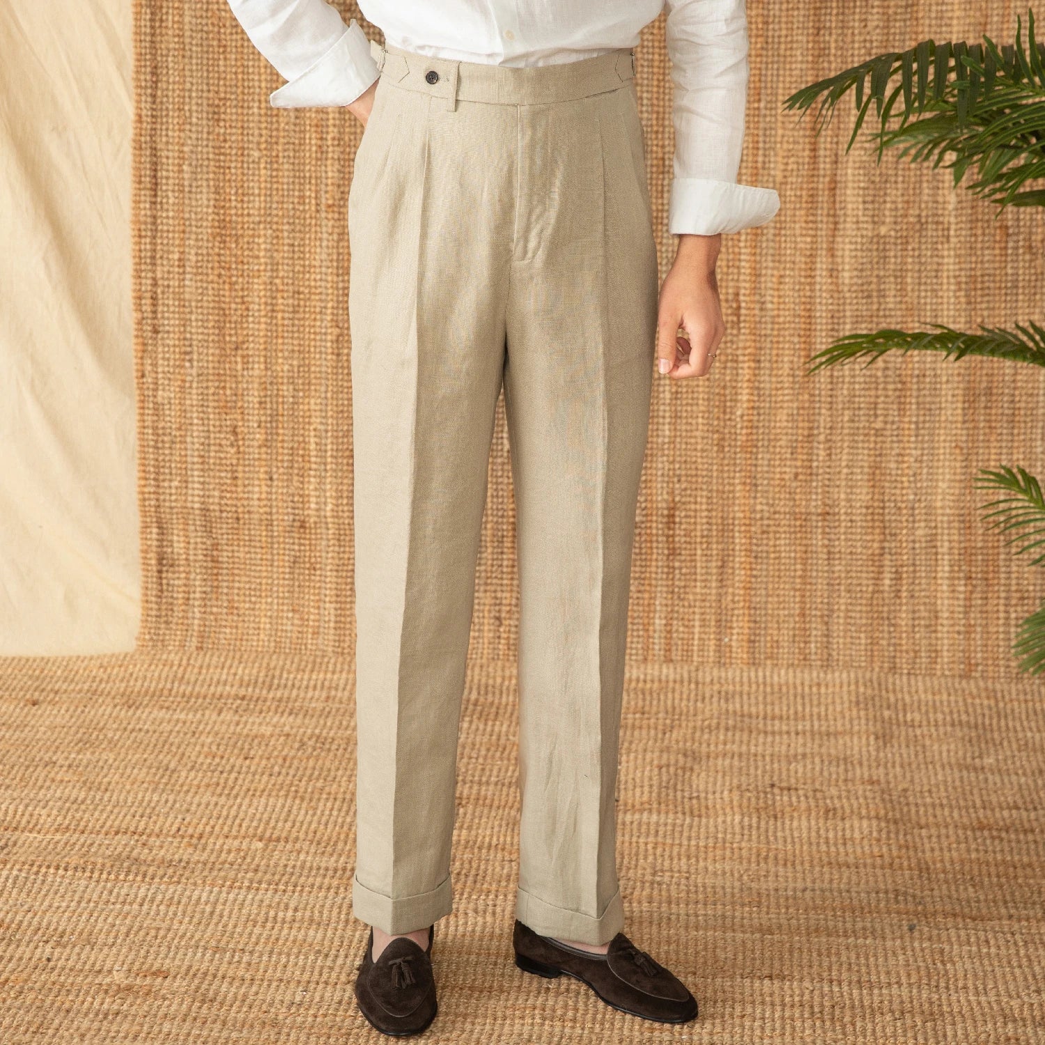 Men's 100% linen trousers in Soft Amber, highlighting the breathable texture, relaxed drape, and natural elegance of the fabric. From Borcelleclothes.
