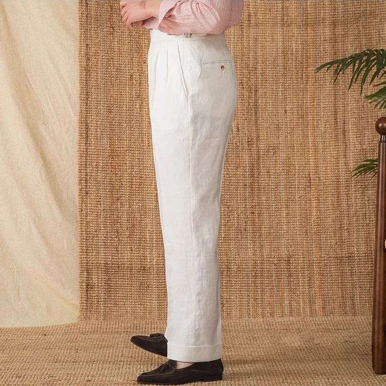 Side view of linen trousers in Wild Sand, highlighting natural linen texture and clean side profile. From Borcelleclothes.