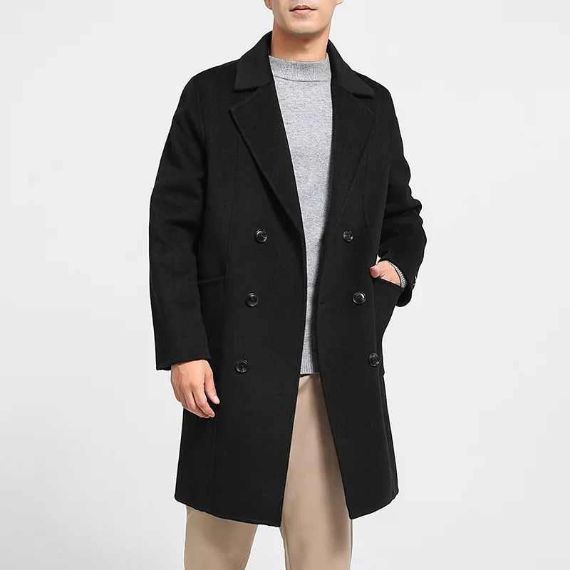 Men’s 900g Wool Coat in Onyx—crafted from 100% double-sided wool with handmade construction. Featuring a double-breasted design, six-button closure, notch lapels, and patch pockets for a refined yet versatile silhouette. From Borcelleclothes.