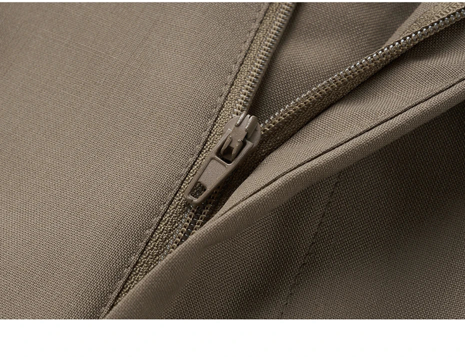 Unzipped zipper fly of Almond Frost trousers, showing construction and texture. From Borcelleclothes.