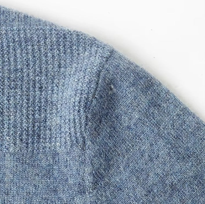 The armhole seaming on the Men's Cashmere Crew Neck Sweater in Rock Blue, highlighting its tailored craftsmanship. From Borcelleclothes.