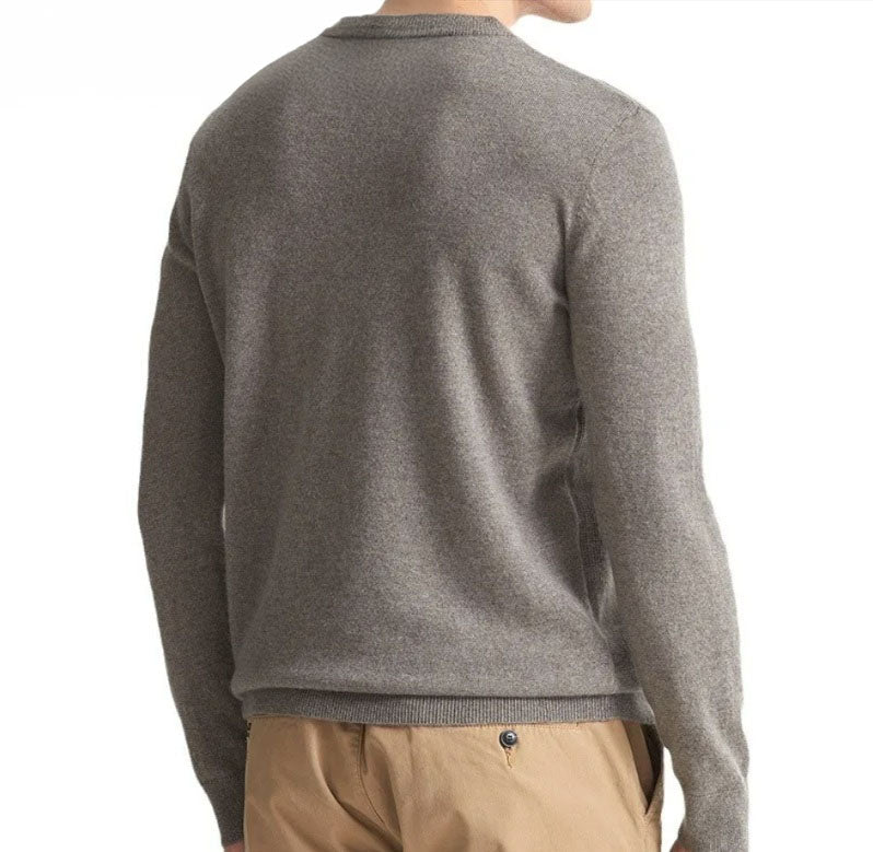 The Back of the Men's Cashmere Crew Neck Sweater in Warm Grey, featuring a smooth stockinette finish for understated elegance. From Borcelleclothes.