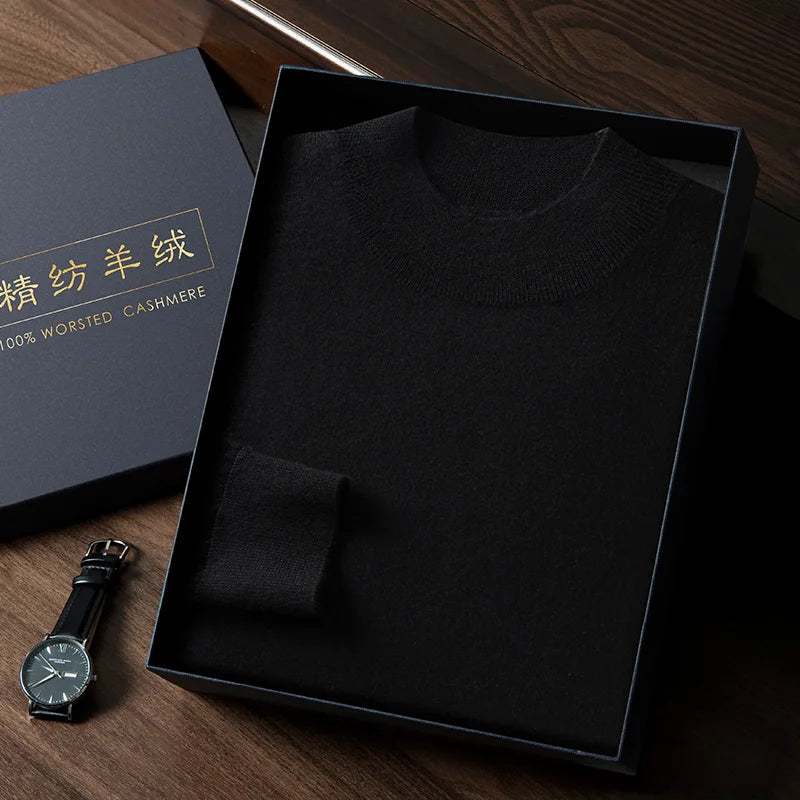 Men’s slim-fitting cashmere sweater in Onyx, featuring plain stockinette stitch with mock neck, dropped shoulders, and ribbed edges — From Borcelleclothes.