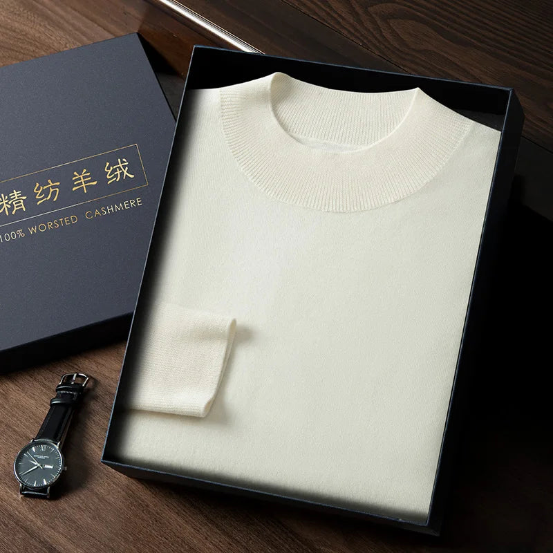 Men’s slim-fitting cashmere sweater in Platinum, featuring plain stockinette stitch with mock neck, dropped shoulders, and ribbed edges — From Borcelleclothes.