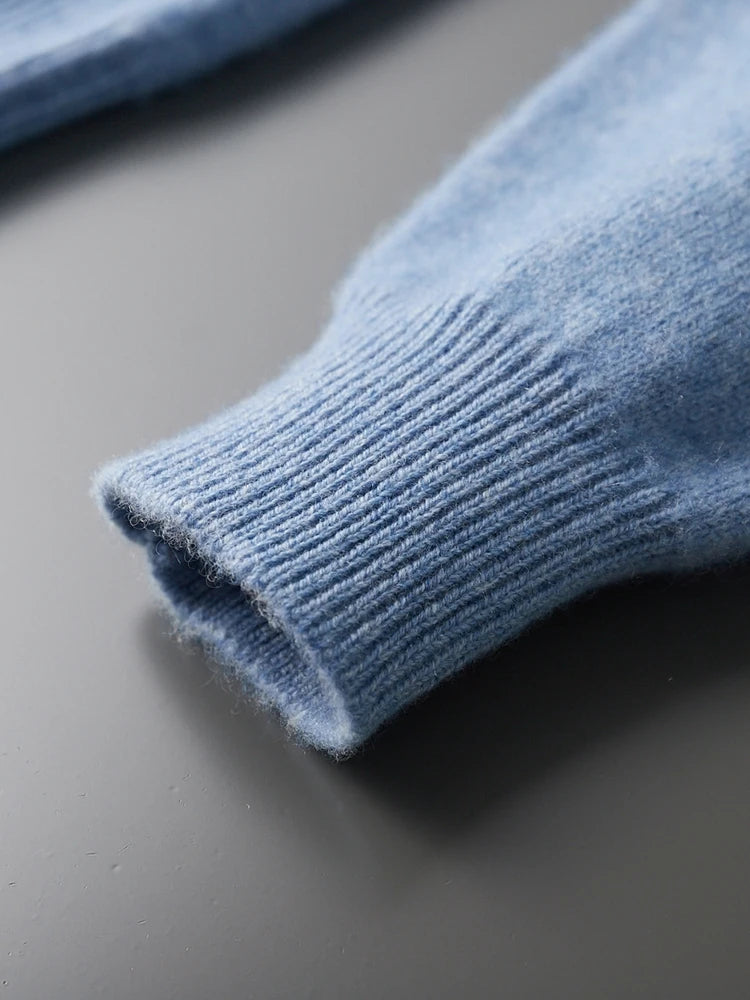 Ribbed cuff of the Rock Blue men’s sweater in diamond-knit cashmere — From Borcelleclothes.