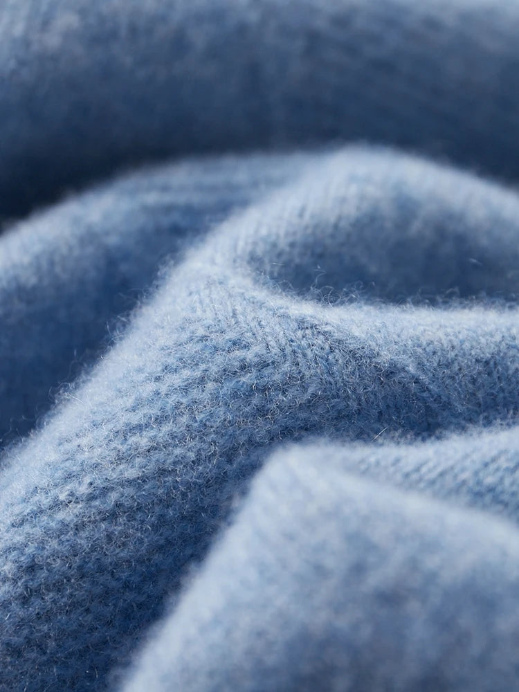 Folded knit texture of the Rock Blue cashmere sweater in diamond motif — From Borcelleclothes.