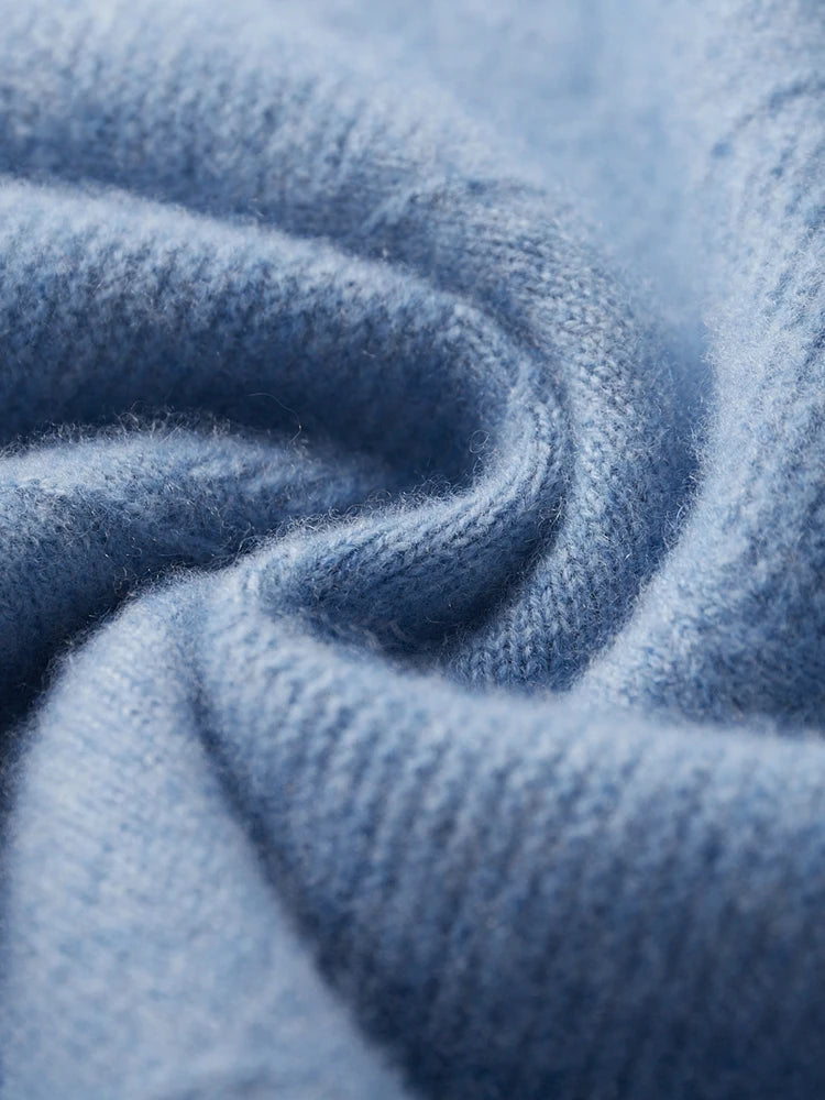 Serpentine folded texture of the Rock Blue diamond motif sweater in pure cashmere — From Borcelleclothes.