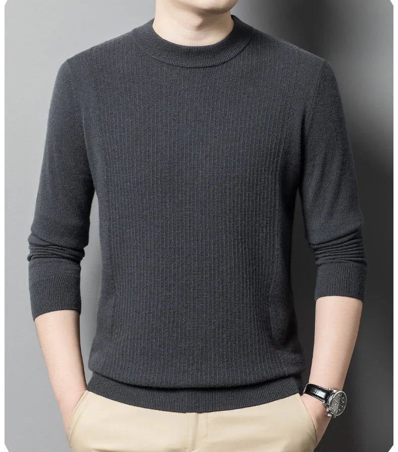 Model wearing the Davy Grey vertical ridge cashmere sweater with hands in pants pockets – From Borcelleclothes.