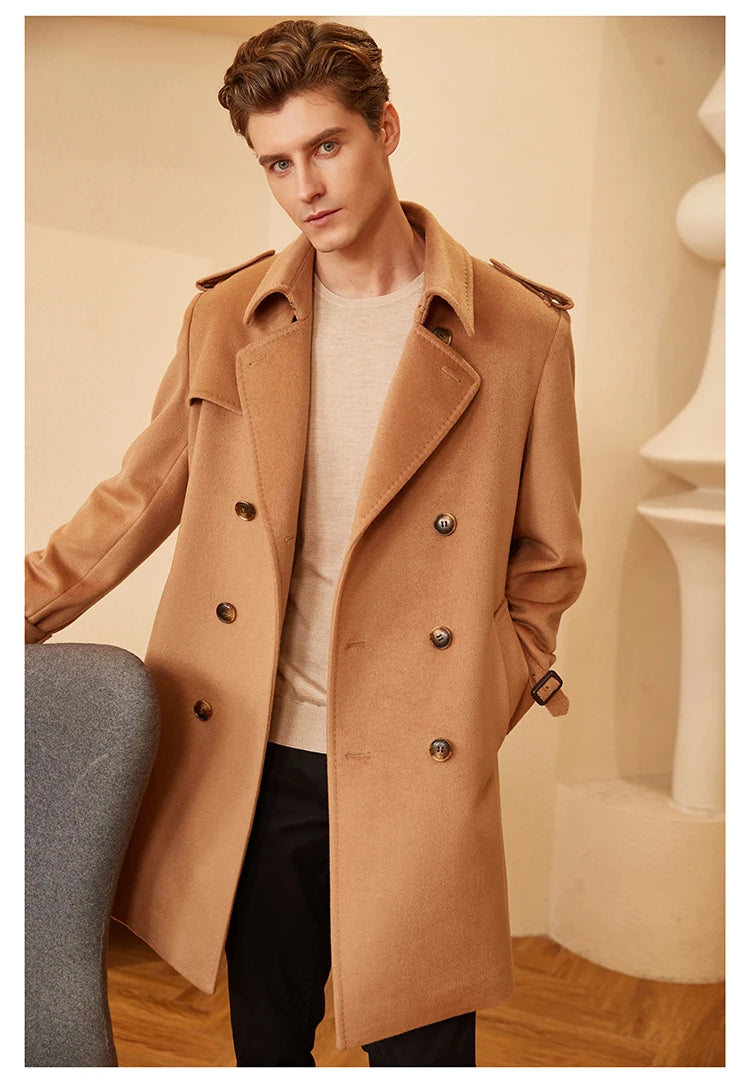 Model in the Men’s Cashmere Trench Coat in Burning Sand, with one hand in pocket, highlighting the diagonal welt pockets and tailored fit. From Borcelleclothes.