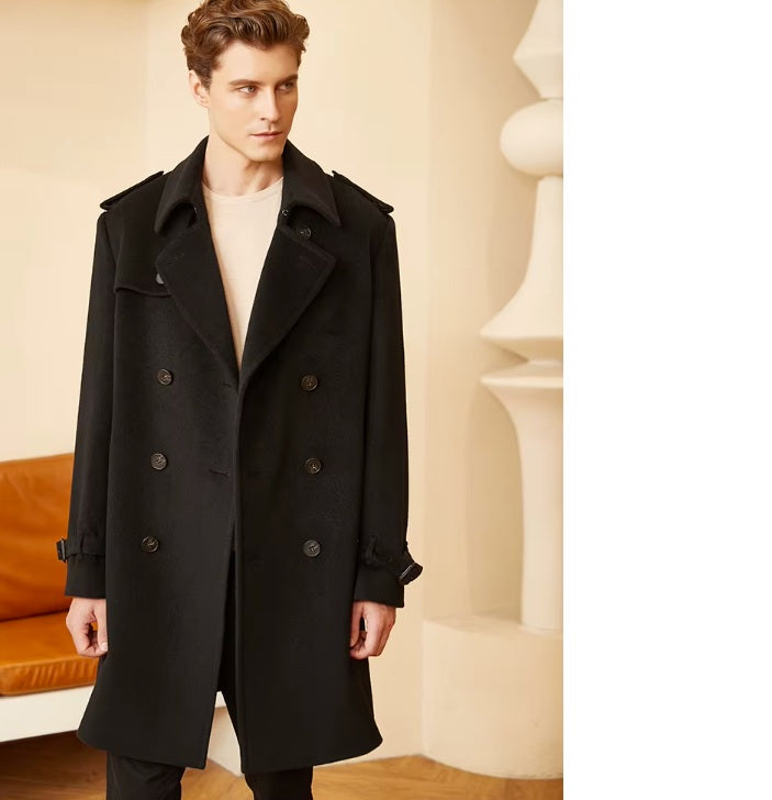 Model wearing the Men’s Cashmere Trench Coat in Onyx, standing with arms straight, showcasing its structured fit and classic trench detailing. From Borcelleclothes.