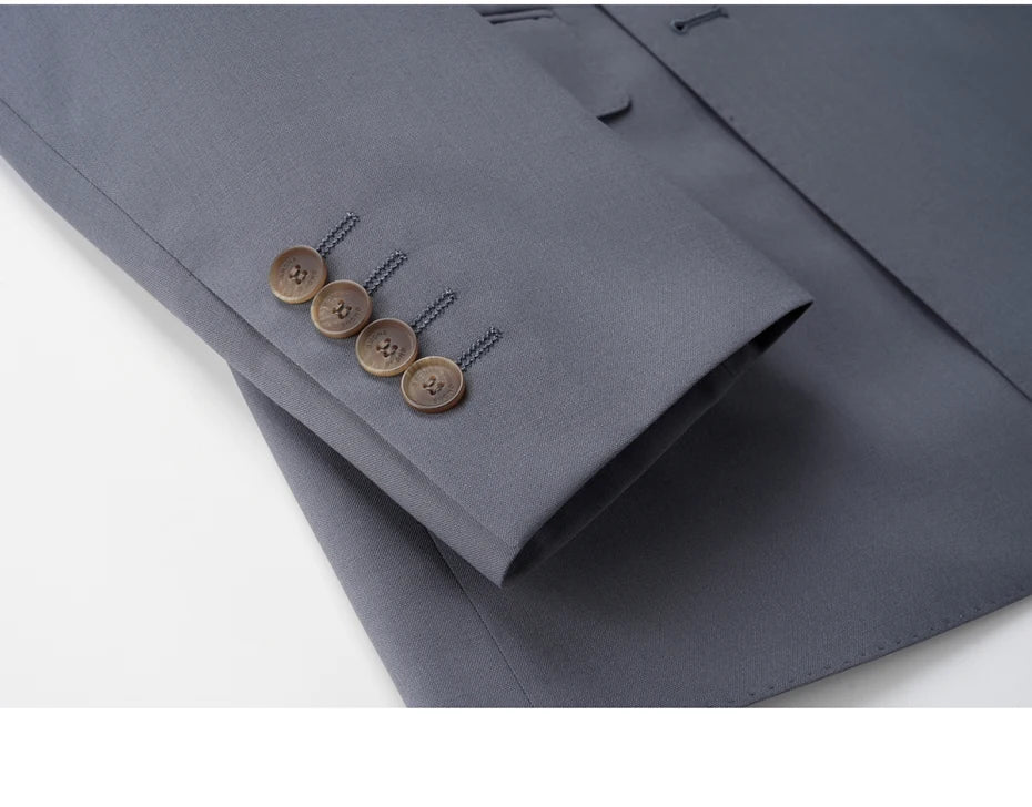 Blazer sleeve from Comet suit with decorative buttonholes and tonal stitching. From Borcelleclothes.