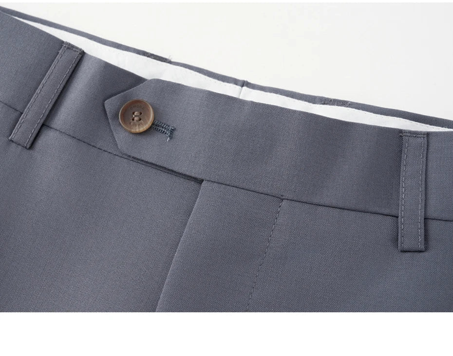 Close-up of Comet trousers’ button closure with horn detail. From Borcelleclothes.
