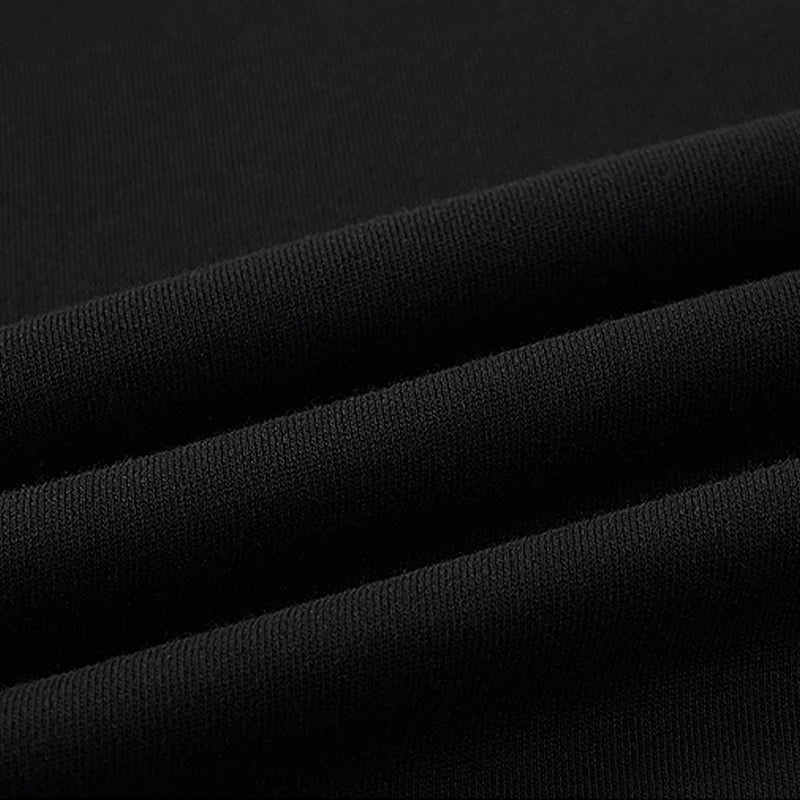 Folded section of the Onyx men's compass sweatshirt showing fabric texture and seam lines. From Borcelleclothes.