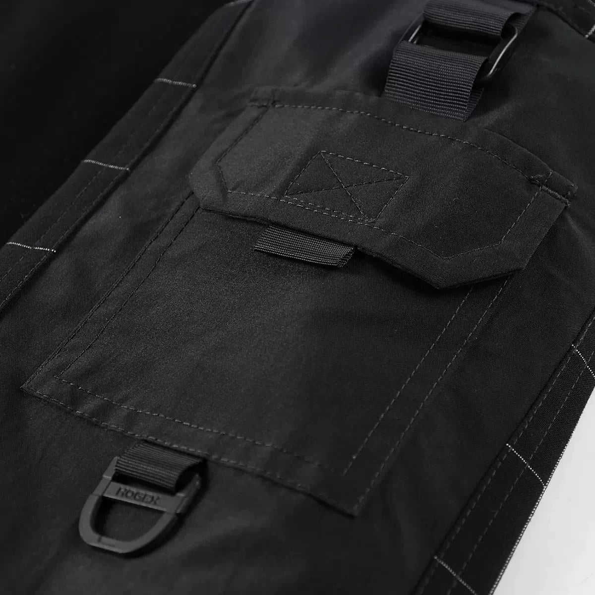 Left sleeve patch pocket with flap and buckle detail on the Onyx men's compass sweatshirt. From Borcelleclothes.