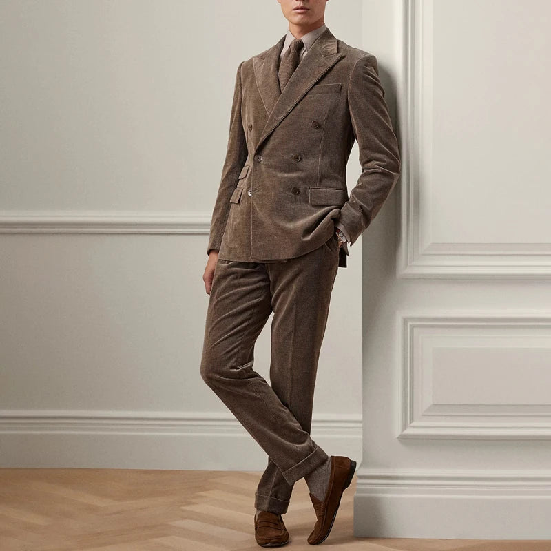 Man pairs Cioccolato corduroy trousers with a matching blazer, capturing the refined, tonal coordination of the look. From Borcelleclothes.