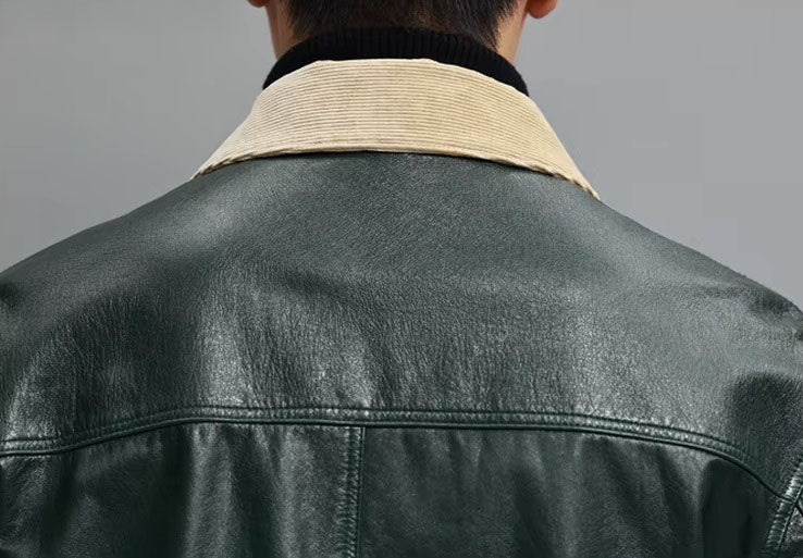 Rear view of the men’s Outer Space jacket focusing on the upper back; shows defined seams, shoulder structure, and contrast corduroy collar from behind. From Borcelleclothes.