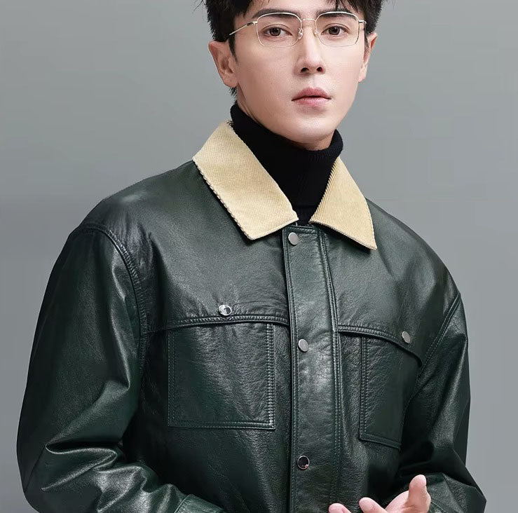 Upper view of the men’s leather jacket in Outer Space; shows the contrast corduroy collar, snapped placket, and clean structure around the shoulders and chest. From Borcelleclothes.