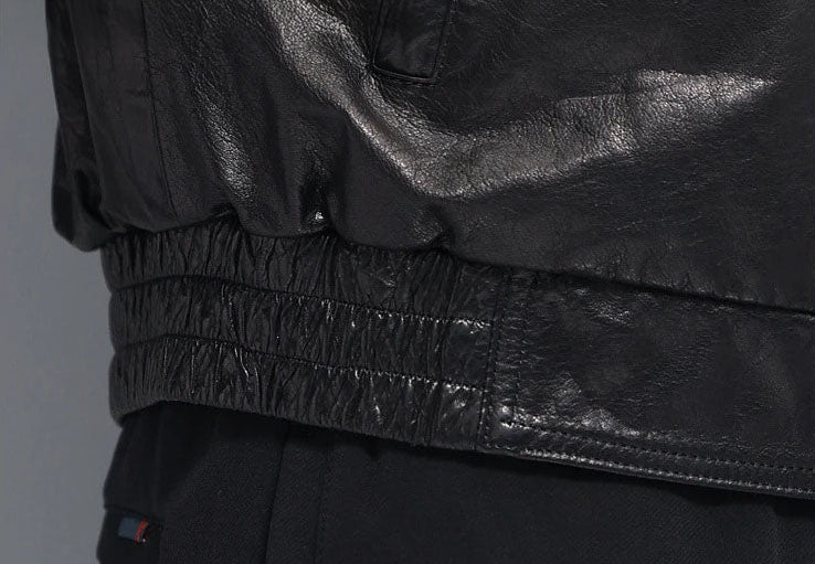 Bottom hem detail: front leather band with elasticated leather at sides and back in three casings — From Borcelleclothes.