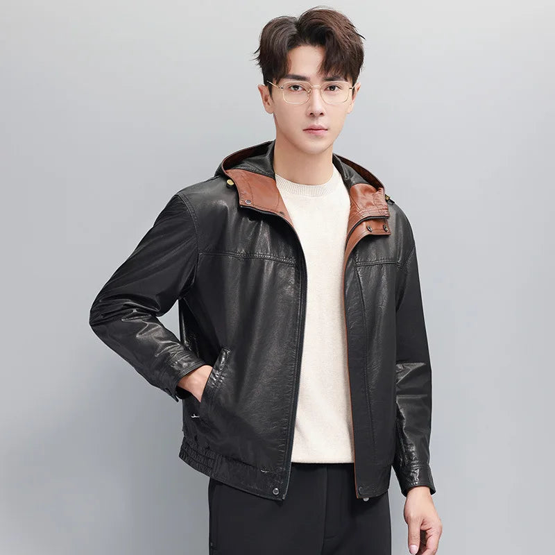 Men’s cowhide leather jacket in Onyx with Nutmeg accents, double-layer leather hood and metal zip, hip-length silhouette — From Borcelleclothes.