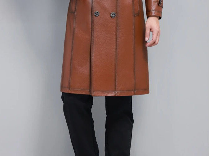 Men’s cowhide leather trench coat in Nutmeg, bottom part showing hem and movement — From Borcelleclothes.