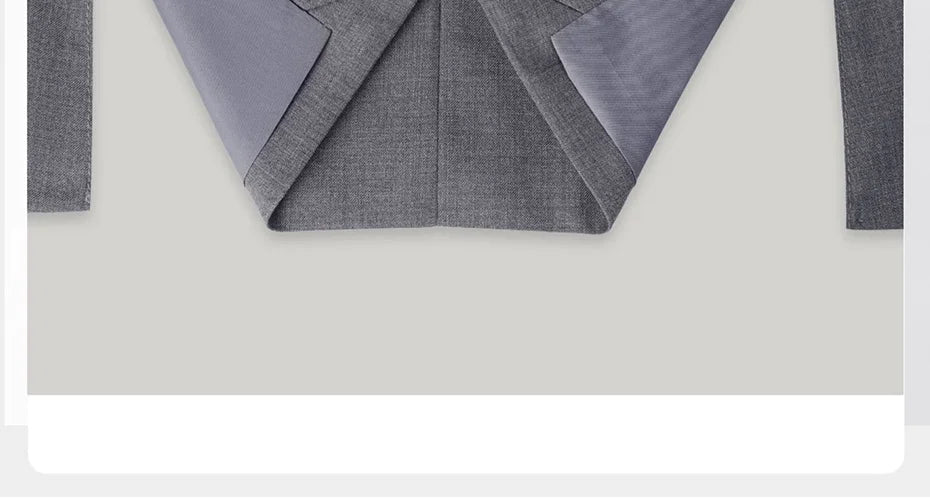 Unfolded hem of the blazer shown in detail, accentuating the structure and finish of the Davy Grey suit. From Borcelleclothes.