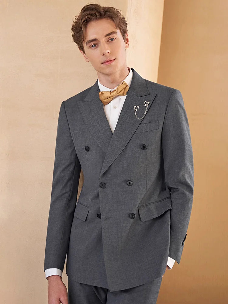 Model wearing Davy Grey suit with one hand behind the back, suggesting quiet confidence and inner poise. From Borcelleclothes.