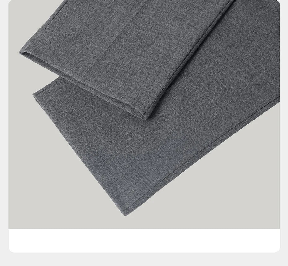 Straight hems of the trousers displayed in detail, reflecting clean lines and classic fit. From Borcelleclothes.