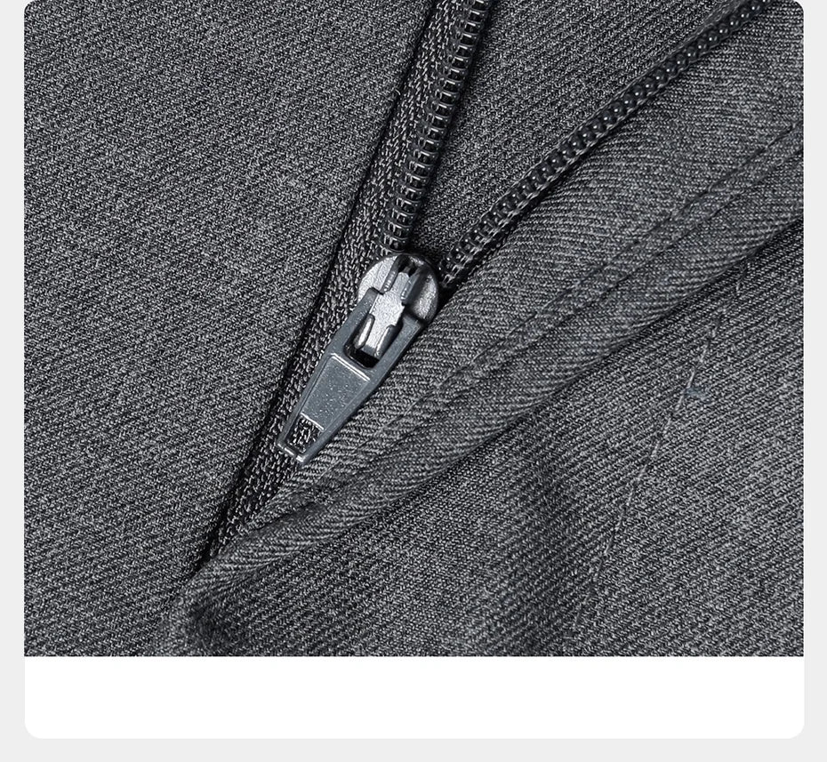 Trousers of the Davy Grey suit with zipper fly partially opened, showcasing tailoring precision. From Borcelleclothes.