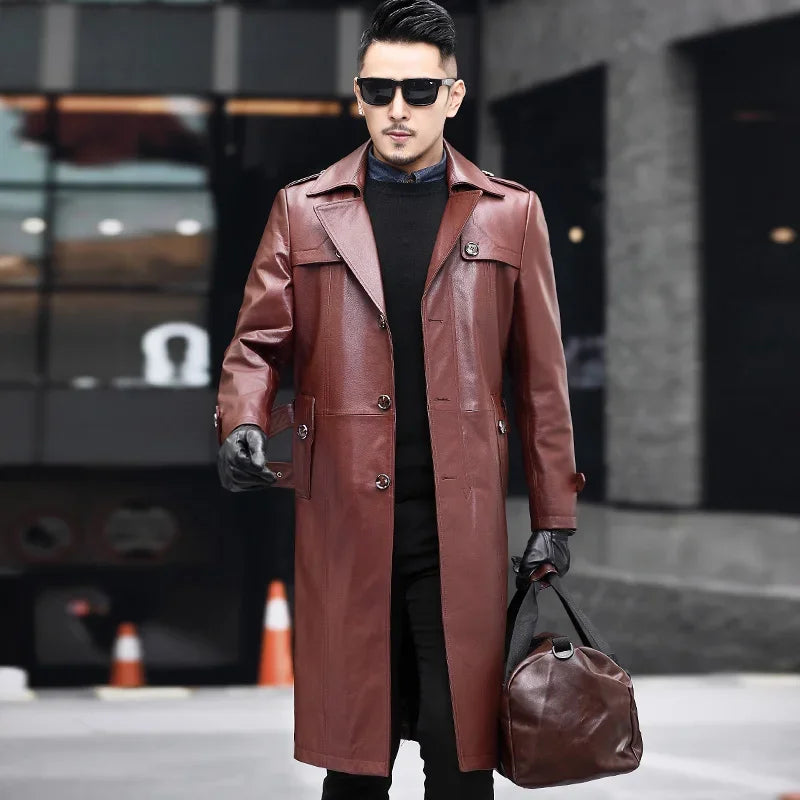 Men’s Deep Coffee cowhide leather trench coat, model carrying bag in motion — From Borcelleclothes.