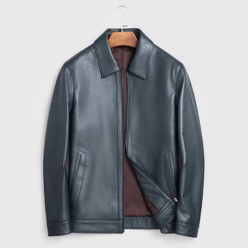 Men's Deerskin leather jacket in Shuttle Grey with pointed collar, hidden waist pockets, snap cuffs, and hem band. From Borcelleclothes.