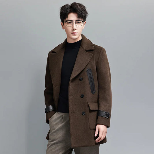 Men’s double-breasted wool-cashmere coat in Dark Rum, with leather accents and inspired by the classic polo coat. From Borcelleclothes.