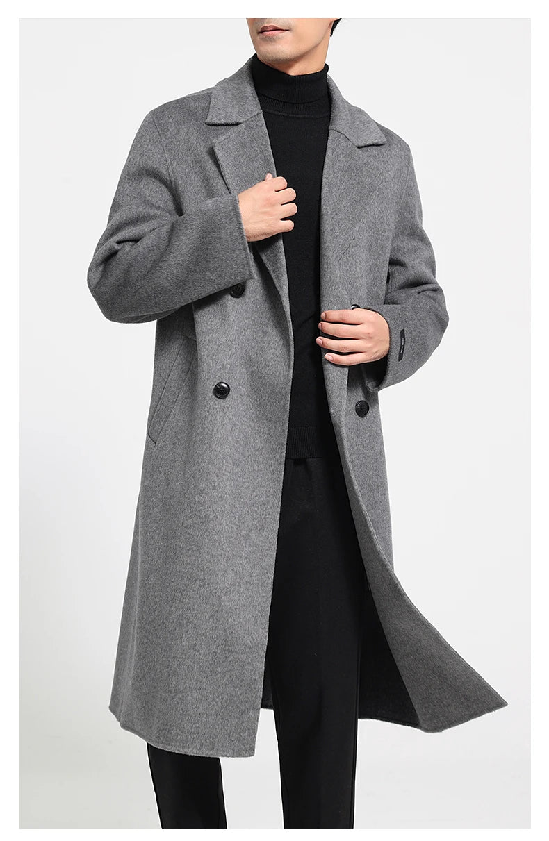 Concord double-faced wool coat, model touching notch lapel. From Borcelleclothes.