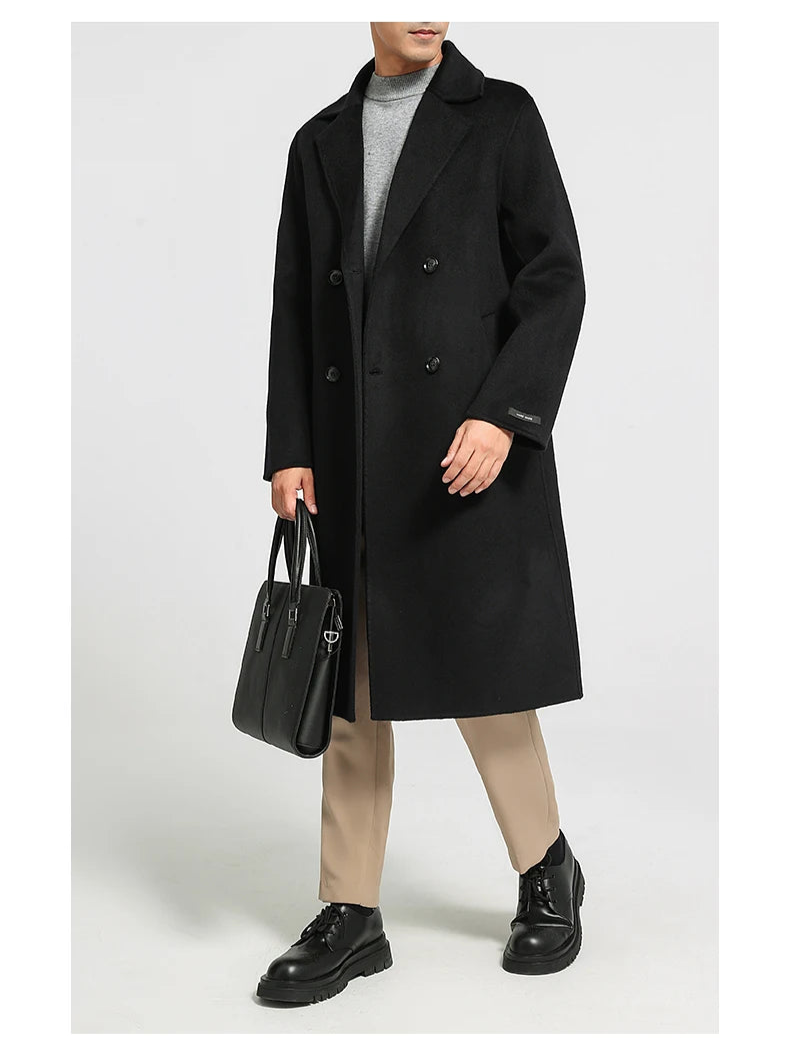 Men’s double-faced wool coat in Onyx, double-breasted, with notch lapels—model in motion. From Borcelleclothes.