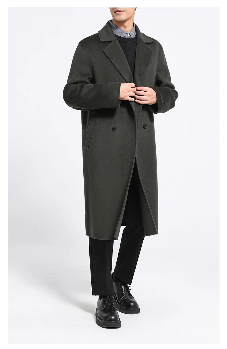 Tuatara double-faced wool coat, model touching lapels. From Borcelleclothes.